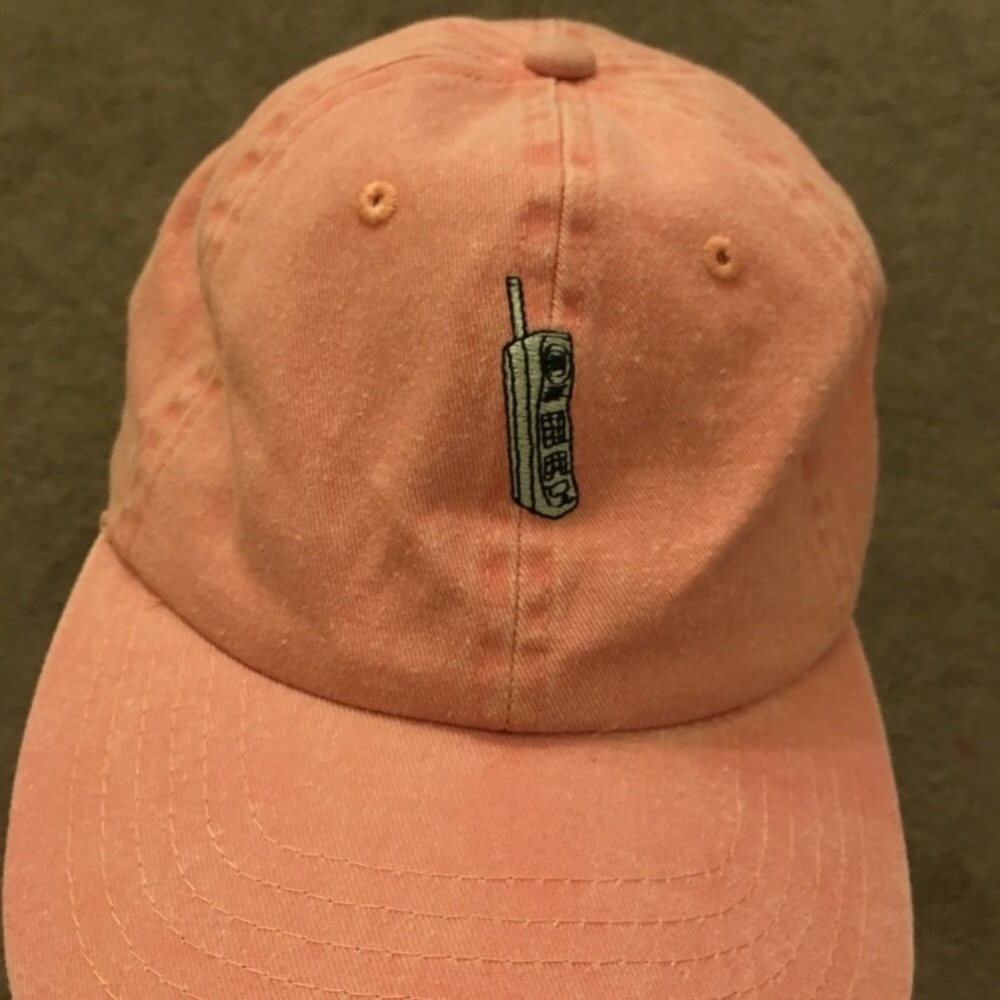 Cute pink baseball hat cell phone logo